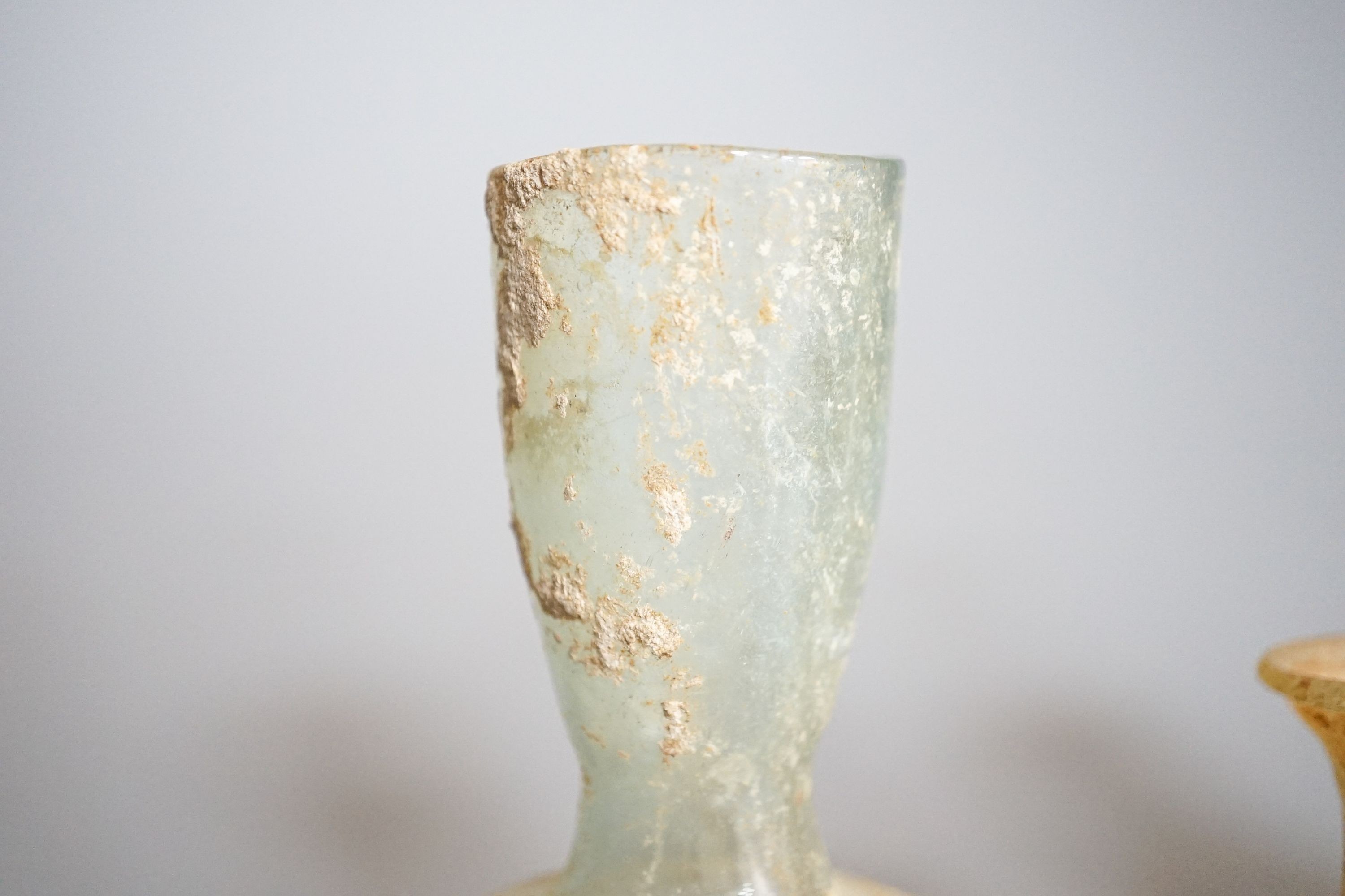 Three Roman glass vessels 14cm